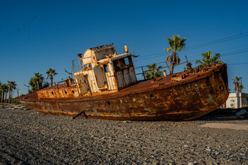 Rusty Abandoned Ship On The Beach In Anaklia Georgia: Old Metal Vessel Resting On Black Sea Shore...