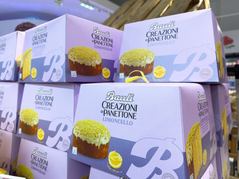 Villach, Austria - October 09, 2025: Bauli Creazioni di Panettone Limoncello boxes stacked in a colorful display, showcasing festive packaging and delicious Italian dessert appeal