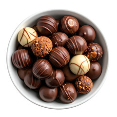 Fototapeta premium Overhead shot of a white bowl filled with assorted chocolate truffles, varying textures and colors