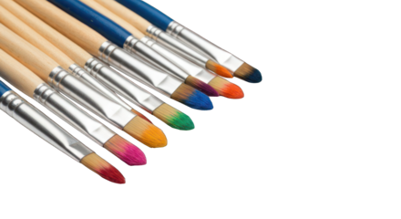 Row of artist paintbrushes with colorful paint tips against a black backdrop