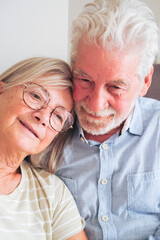 Senior couple spending quality time together at home, sharing a tender and loving moment that reflects affection, companionship, and a healthy, peaceful retired lifestyle
