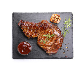 Delicious grilled beef steak with herbs, spices and ketchup isolated on white, top view