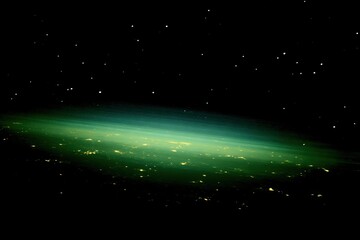 Glowing cityscape on a planet under starry sky from orbit