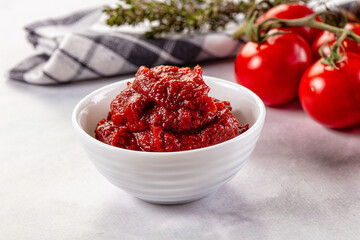 Red organic fresh tomato paste