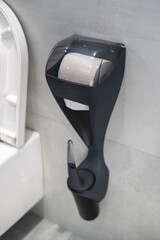 Black  and modern 2 in one  dispenser for toilet paper and toilet brush