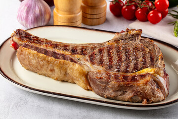 Grilled ribeye beef steak with bone
