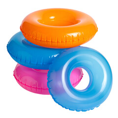 Stack of colorful, inflatable rings, stacked on a black background for recreational water use