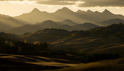 Majestic mountain range at sunset golden light and rolling hills panorama
