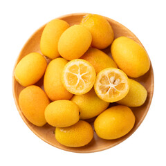 Top view of fresh kumquats fruit on wooden plate 