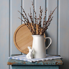 Still life with pussy willows, easter bunny, rustic table