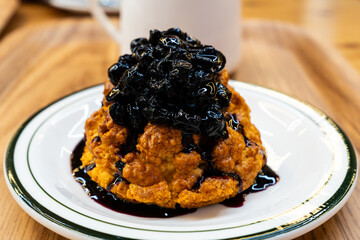 blueberry pie on a white ceramic dish