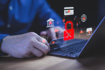 Cybersecurity concept showing data protection alert with red lock icon on laptop, representing online privacy risk, internet security breach, and protection against digital hacking and cyber threats.