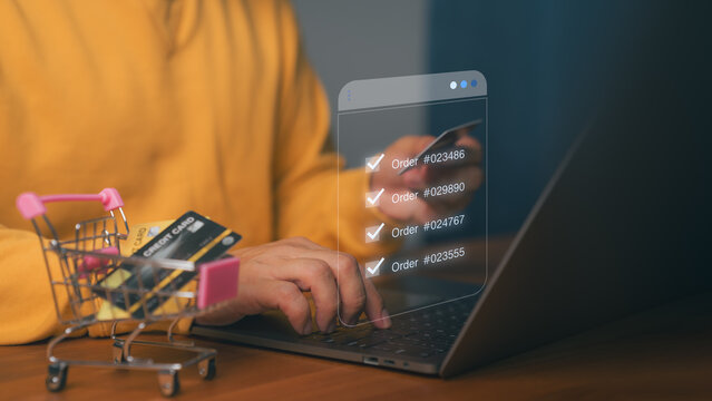 Online shopping and order management concept showing person using laptop with credit card and virtual order list, symbolizing e-commerce transaction, digital retail system, and secure online payment.