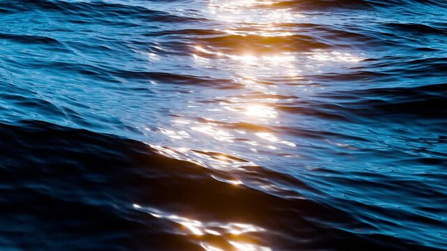 Sunlight sparkles over ocean waves. Slow motion close up of disturbed ocean water surface. Loop 4K animation