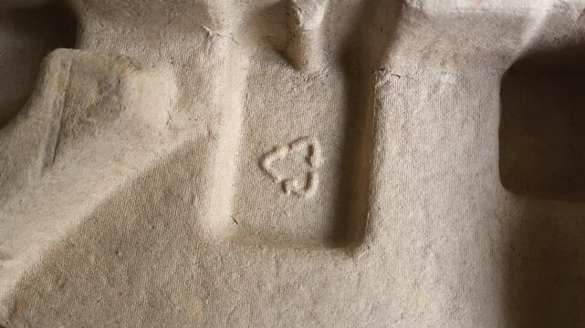 Cardboard box with recycling mark. The concept of cardboard and paper waste disposal. Garbage recycling