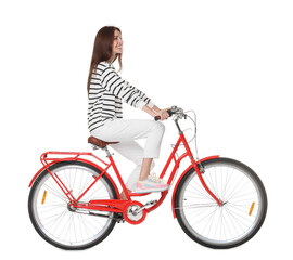 Naklejka premium Smiling woman riding red bicycle on white background