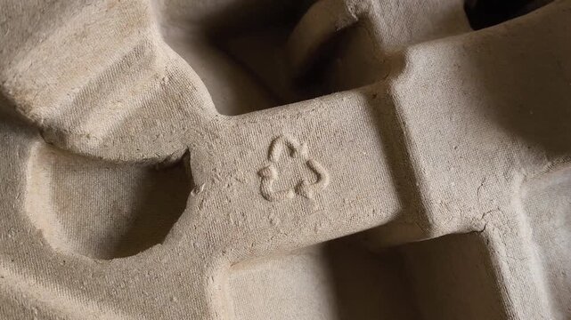 Cardboard box with recycling mark. The concept of cardboard and paper waste disposal. Garbage recycling