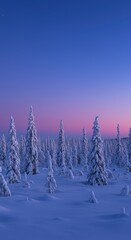 Snow covered trees under a blue and pink sky creating a serene winter wonderland landscape scene