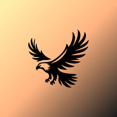 Powerful Spreading Wings Eagle Silhouette Vector Logo Design with Gold Gradient Background