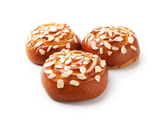 Tasty roll buns with almond flakes isolated on white