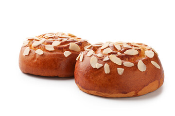 Tasty roll buns with almond flakes isolated on white
