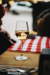 Elegant Wine Glass on Checkered Tablecloth Scene