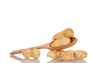 Unshelled peanuts isolated on white background, macro.	