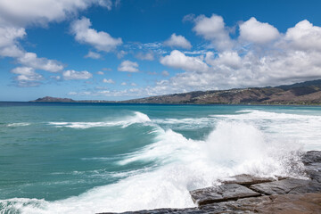 Maunalua Bay.China Walls / Koko Kai Beach Mini Park, East Honolulu, Oahu, Hawaii. Pacific Ocean. In the distance is Koʻolau Range(windward shield volcano)
