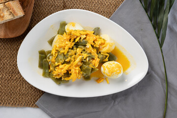Green beans, boiled egg, healthy meal, baguette topping, top view