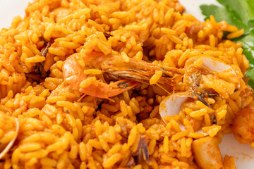 Seafood paella with prawns, clams, mussels and rice