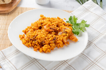 Spanish paella seafood shrimps rice dish dinner
