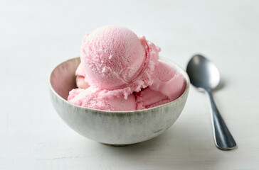 bowl of pink raspberry ice cream