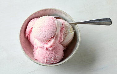 bowl of pink raspberry ice cream