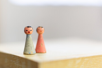 Two little dolls. Retro toys, with space for your logo or text.