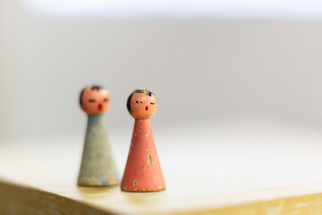 Two little dolls. Retro toys, with space for your logo or text.