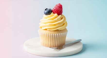 Vanilla cupcake with yellow frosting and fresh berries. Sweet dessert for a birthday celebration. Isolated pastry on a colorful pastel background