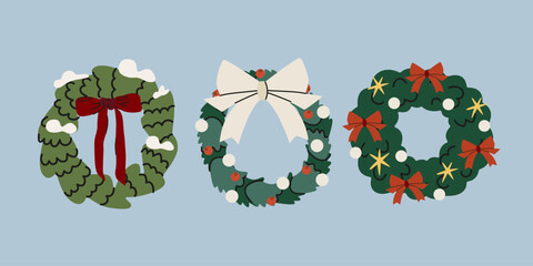 Christmas door wreath set in cartoon doodle style. Festive wreath with bow ribbon for winter holiday decoration. Xmas holiday elements. Seasonal vector illustrations © luamor