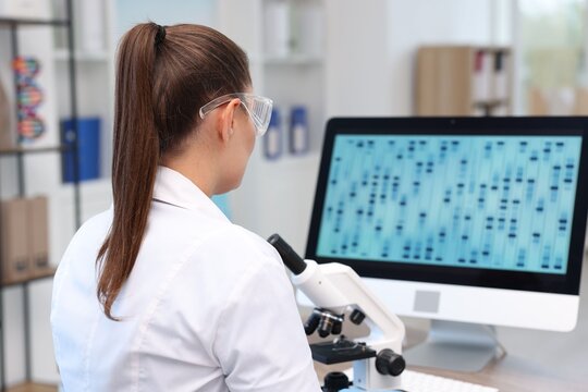 Research in genetics. Scientist working at table in laboratory