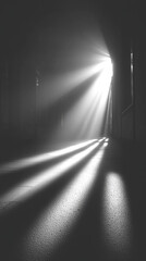 Dramatic, high-contrast image of light rays piercing a dark void