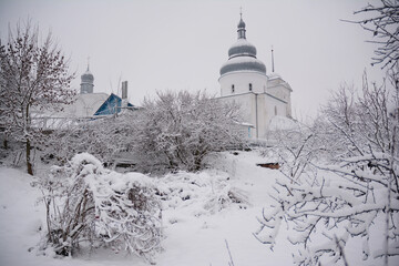 Pokrova Ukrainian Church in Nizhyn, Ukraine after snowfall. View of the Pokrova church from behind