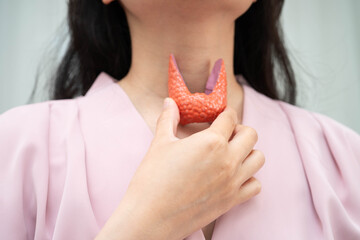 Hyperthyroidism, Overactive Thyroid, Thyroid Lymphoma, Asian woman with thyroid gland human anatomy...
