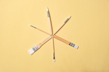 Collection of new paintbrushes of various sizes and styles for painting, crafting, art projects, and detailed hobby work. Tools of artist. New brush set. Drawing tassel variety. High quality photo.