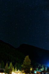 Fototapeta premium starry sky over Pragelato, Val Troncea 