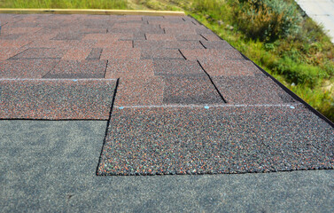 Asphalt shingles roofing construction top view. Roofing construction concept.