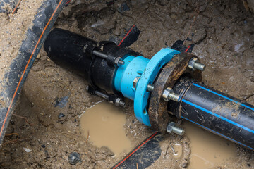 The method for temporarily repairing a 90mm HDPE pipe using PVC fittings.