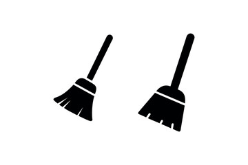 Two black brooms shown in a simple graphic style silhouette