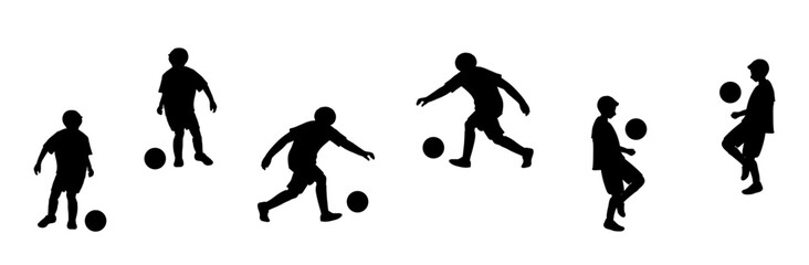 シルエット　サッカーをする少年　イエローユニフォーム　全身