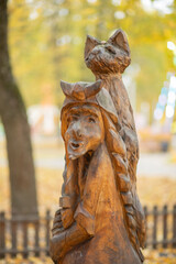 Autumn landscape, autumn park, autumn city from above, view from a Ferris wheel of an autumn park, autumn leaves, handmade wooden figures, animals carved from wood