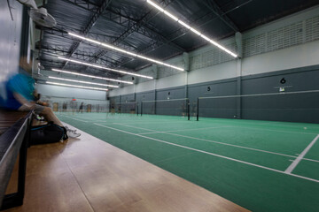 Nighttime Badminton Court With Players
