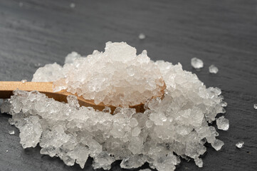Dead sea salt pile, white crystals for body spa, sodium chloride similar to crushed ice, spa scrub